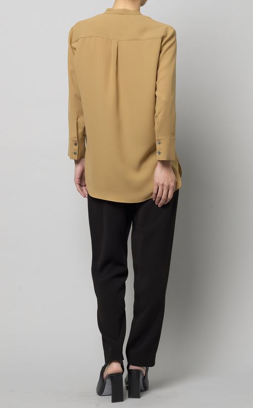 ラウンドヘムタイブラウス