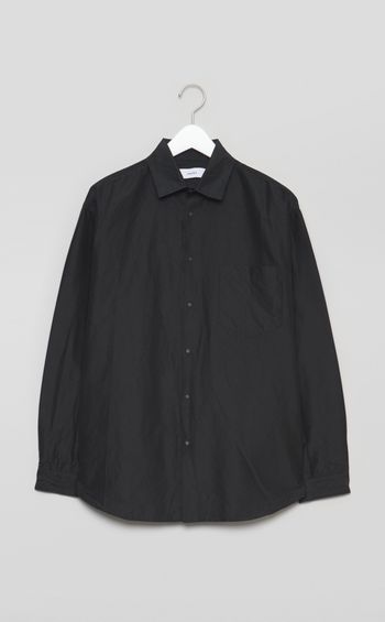 スナップボタンシャツ