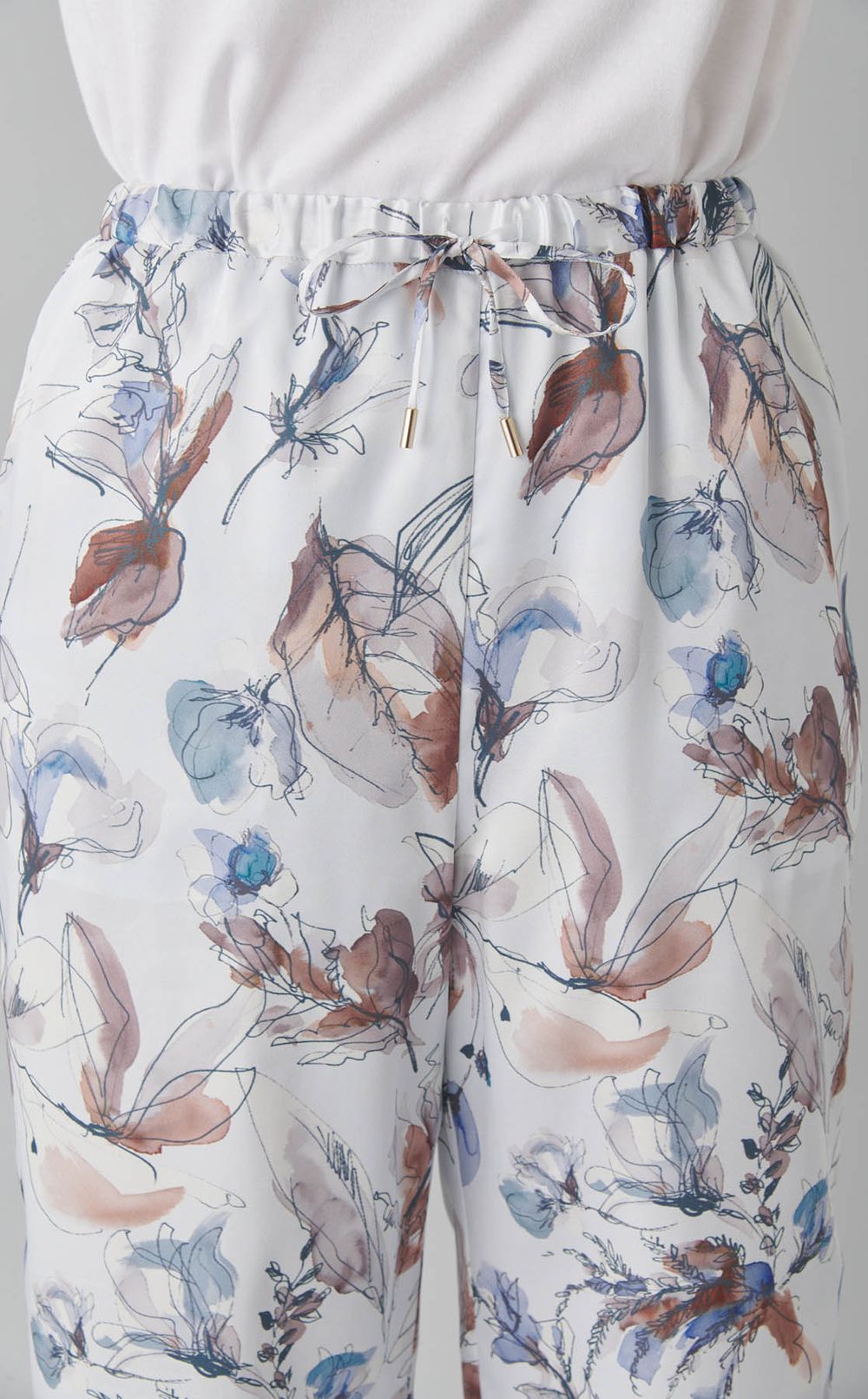 ボタニカルプリントパンツ
