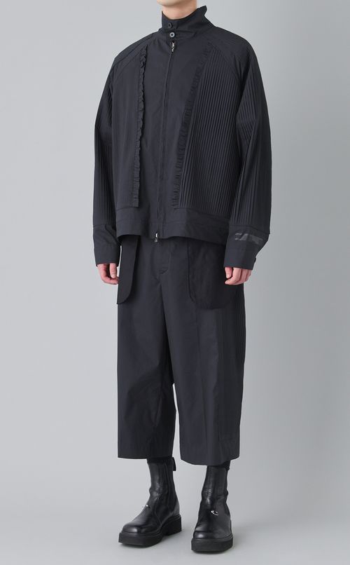 プリーツパネルパンツ