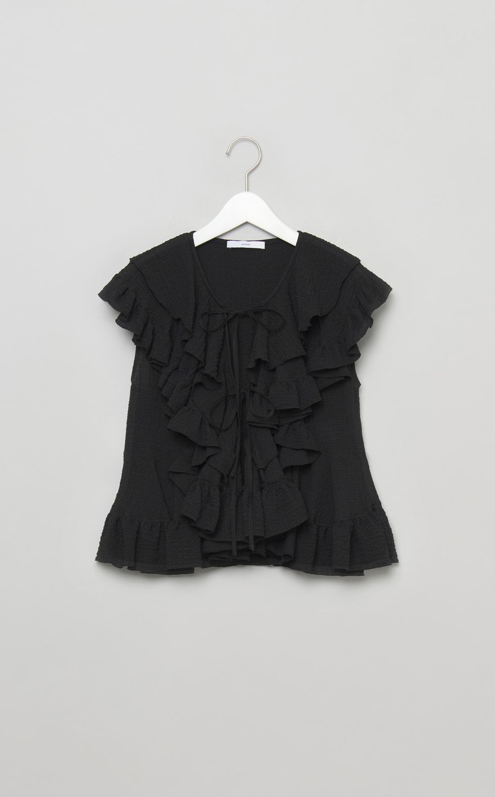 ペプラムフリルブラウス