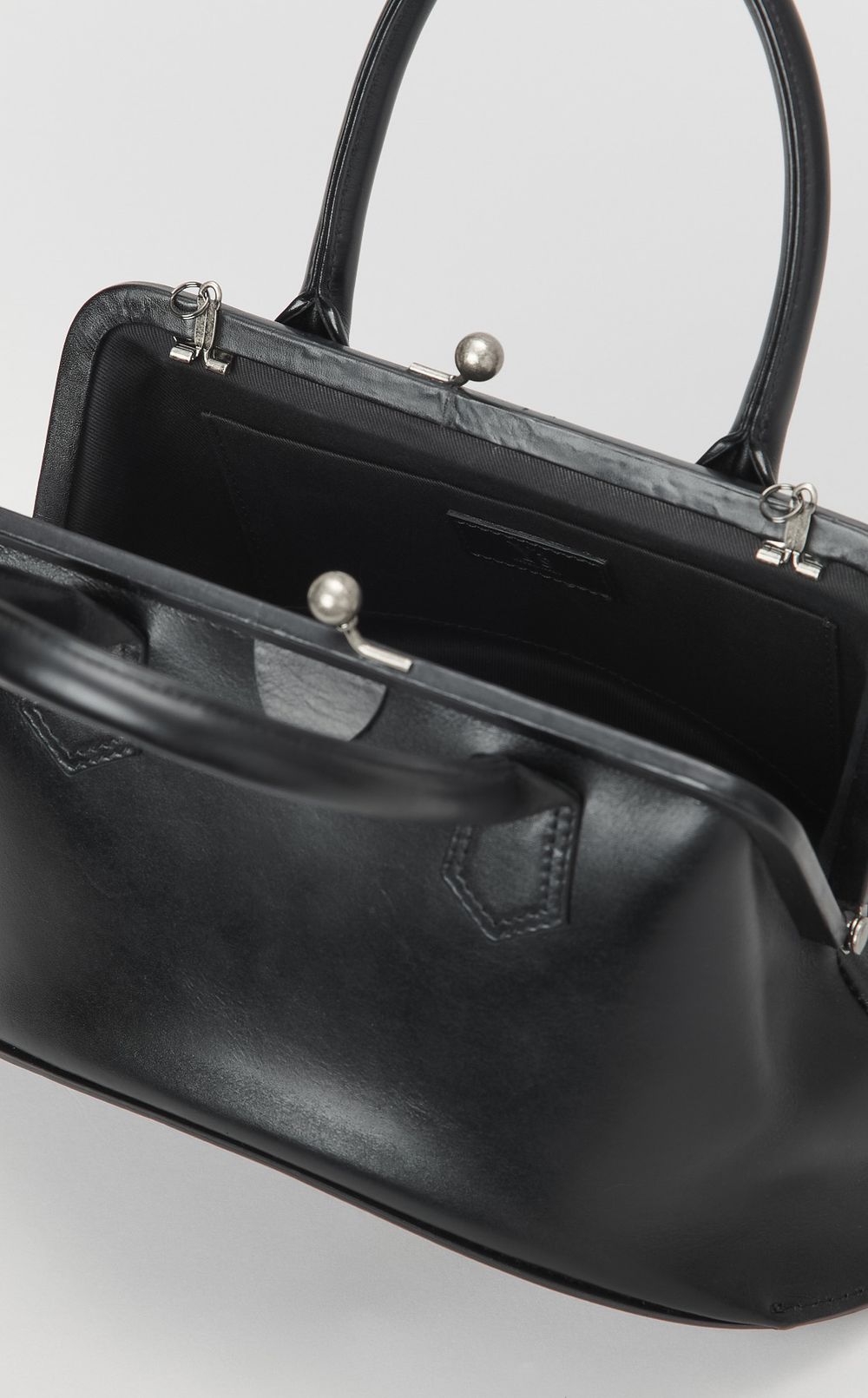 反り底ガマグチレザーバッグ