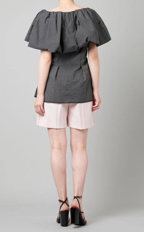 ラッフルスリムブラウス