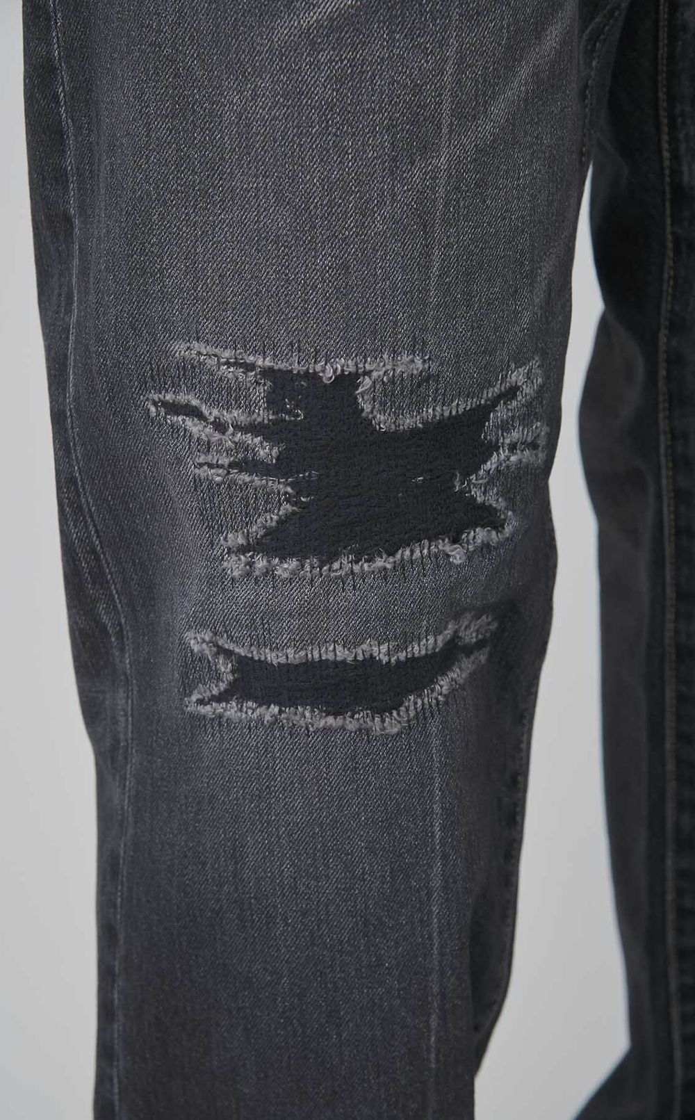 ダメージドデニムパンツ