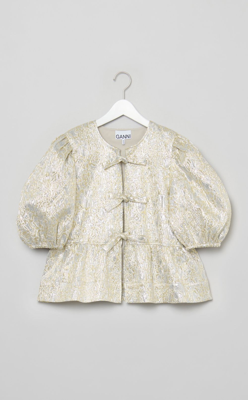 メタリックリボンペプラムブラウス