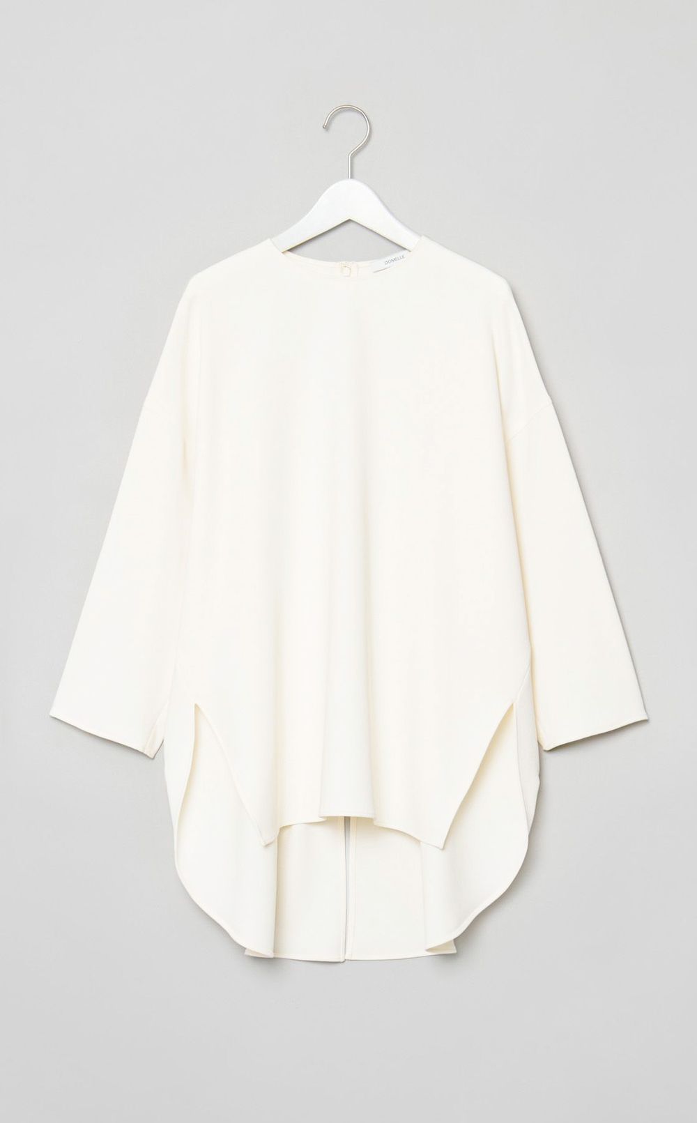 バックラウンドヘムブラウス