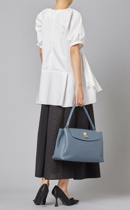 ペプラムVネックブラウス