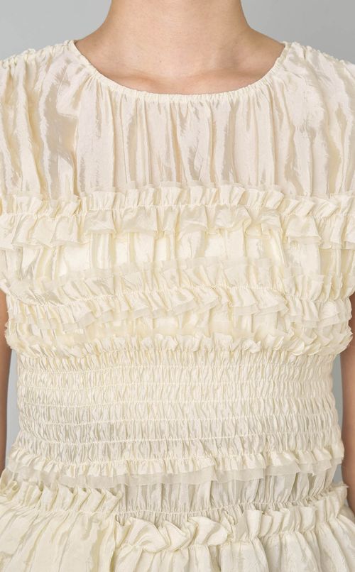 シャーリングフリルトップス