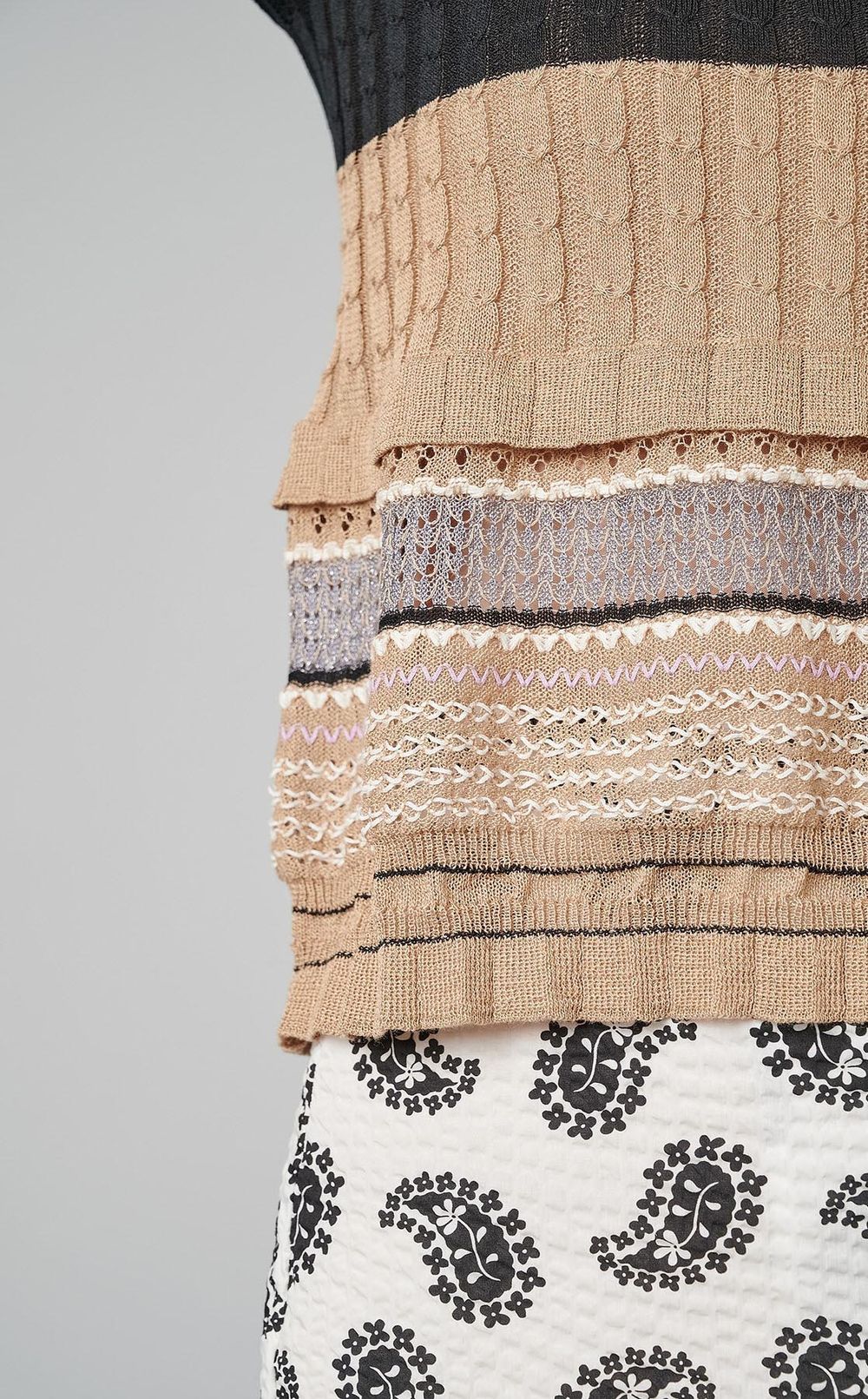 マルチボーダーペプラムニット