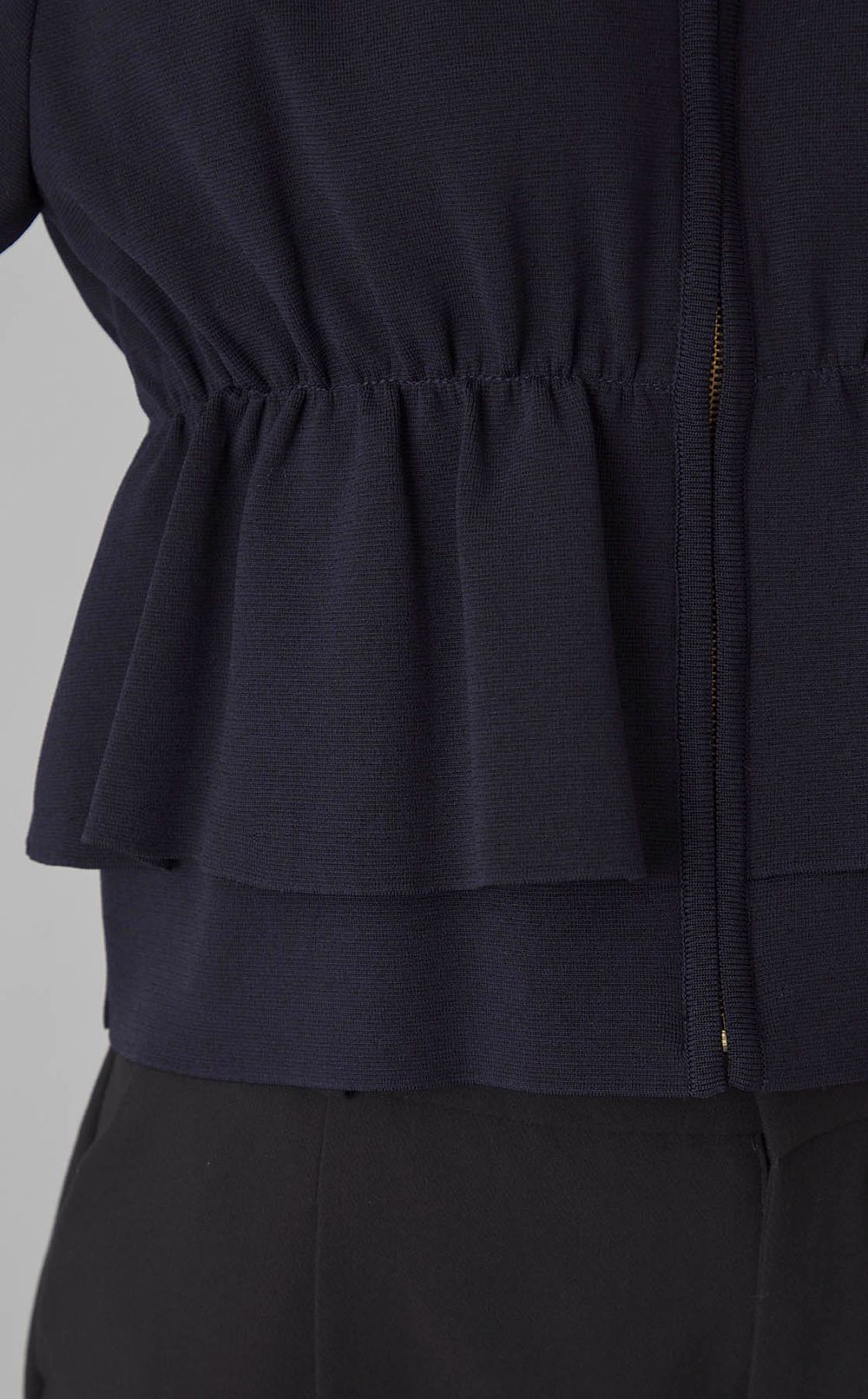 ミラノリブペプラムニットジャケット