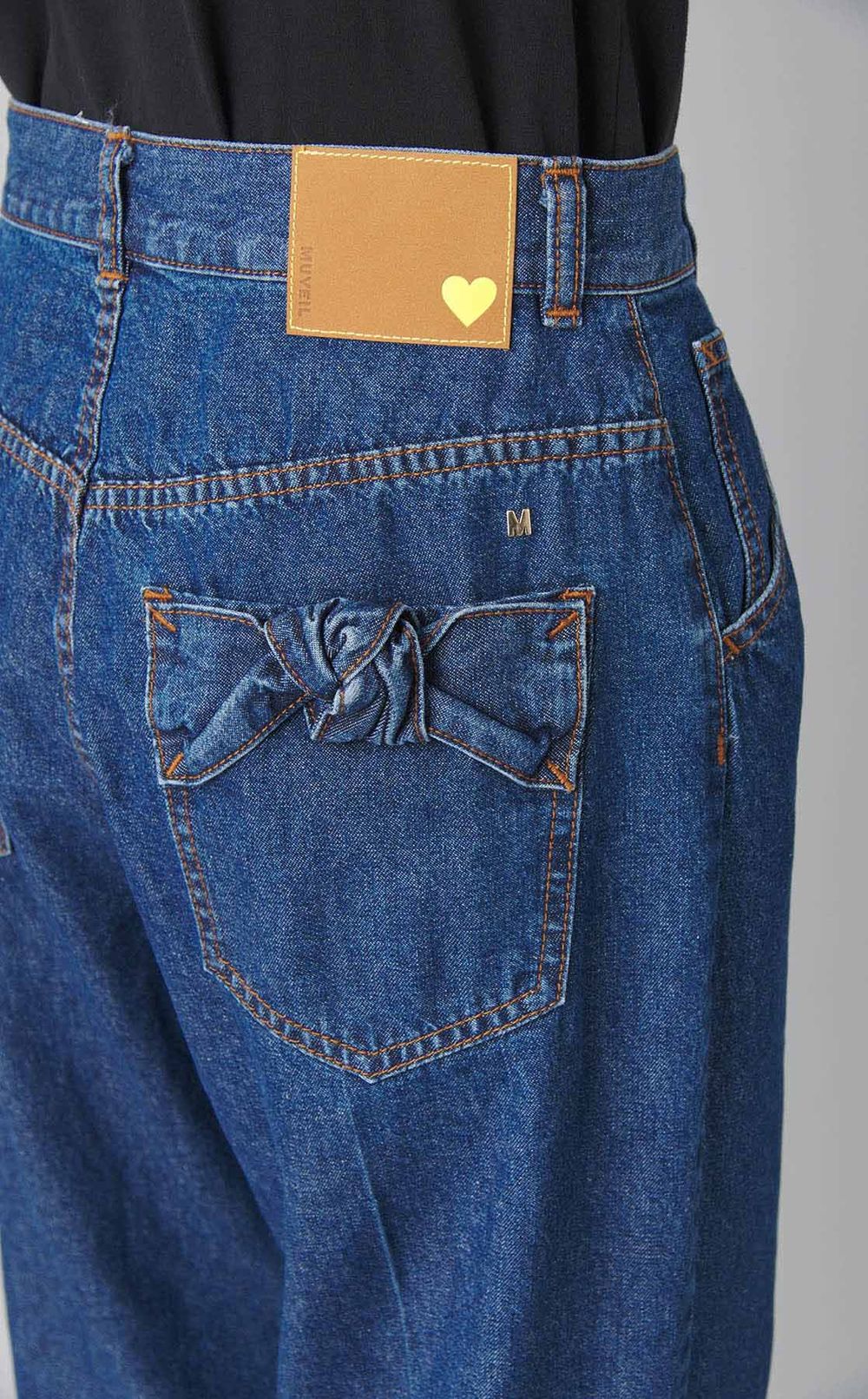 センタープレスリボンデニムパンツ