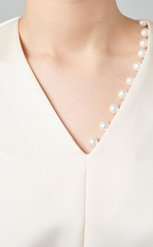 ワンサイドパールペプラムブラウス