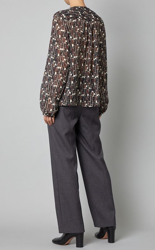 ジオメトリックプリントフリルブラウス