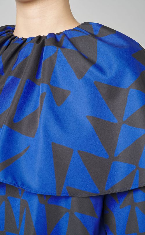 幾何プリントケープブラウス