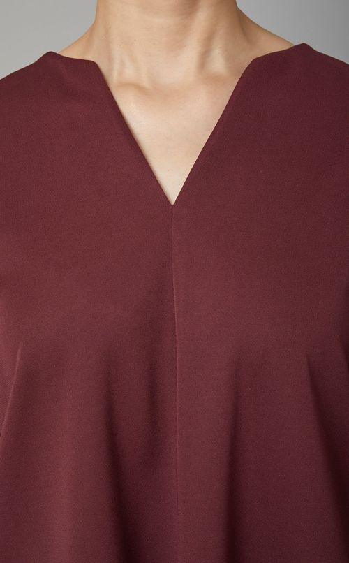 Vネックベルスリーブトップス