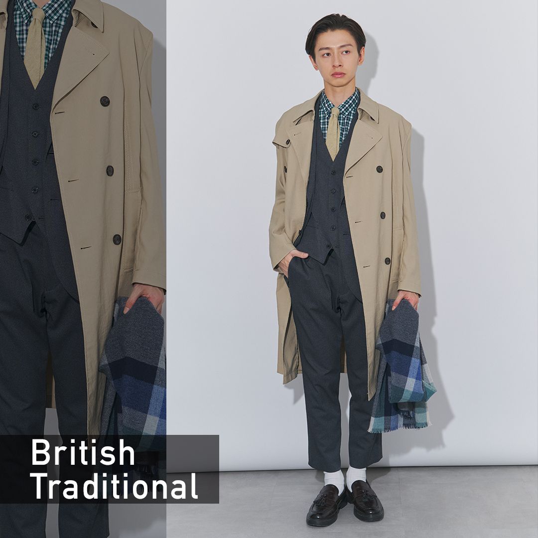 グレーのセットアップにベージュのトレンチコートを合わせたブリトラスタイル