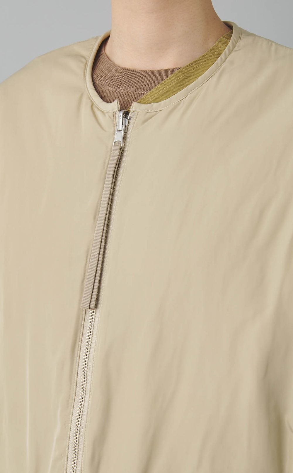 リバーシブルノーカラーブルゾン